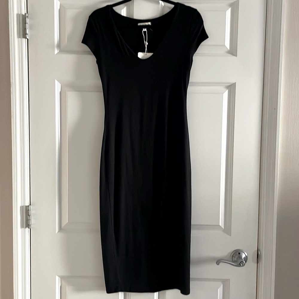 Midi black dress that hugs your curves